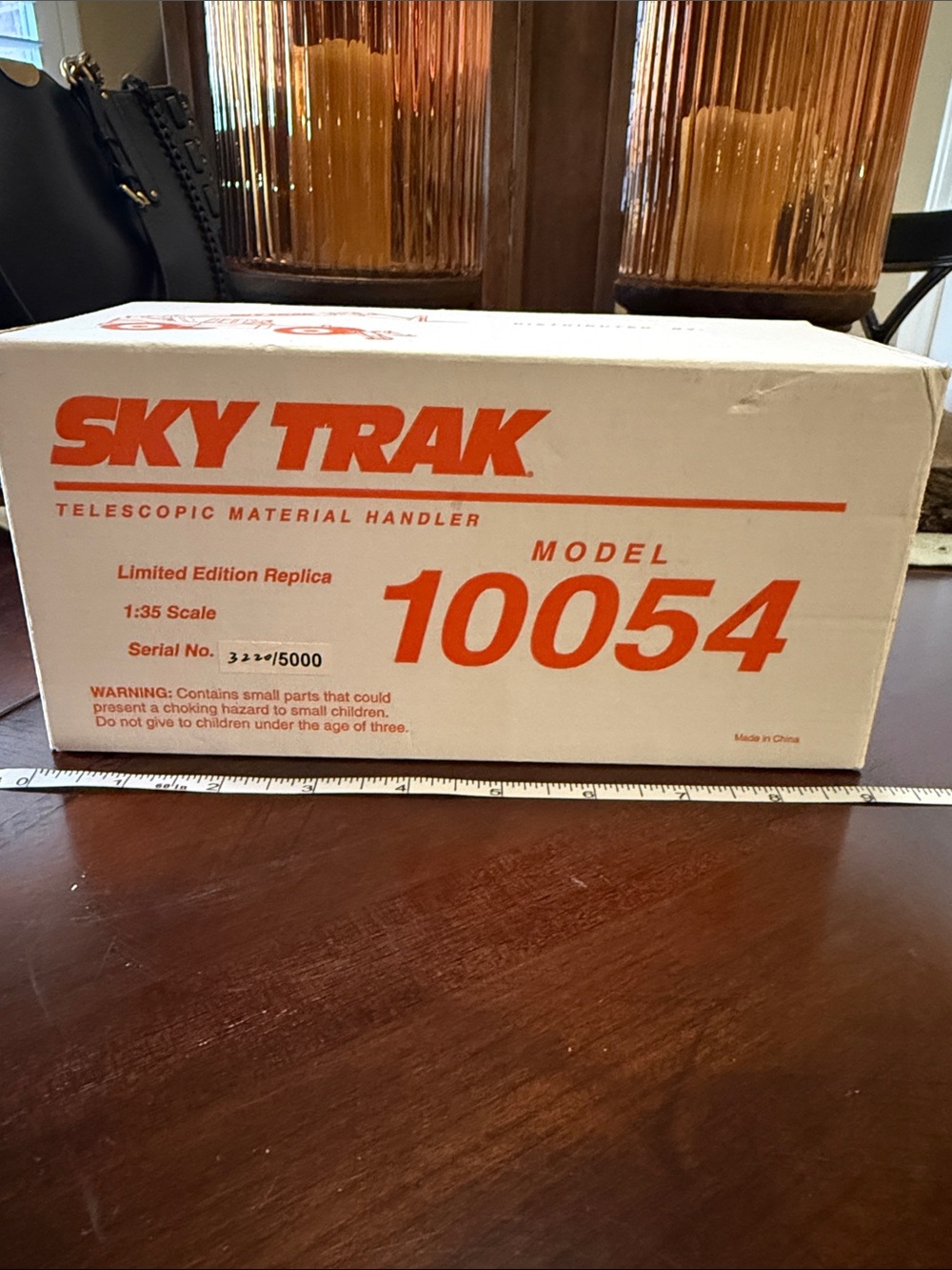 Sky Trak Model 10054 Telescopic Material Handler - White with Orange Graphics